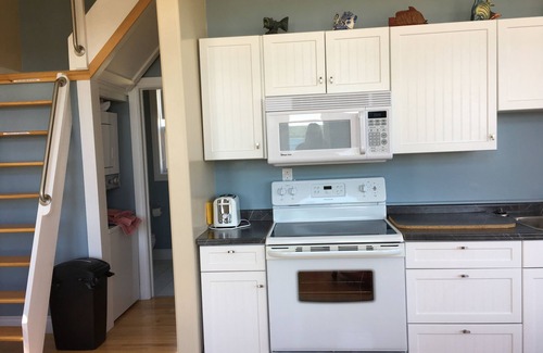 Cape Dauphin Cottage | Serene Ocean View Beach House with Pet-Friendly Amenities