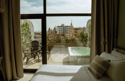 Cartagena Walled City Hotel | Spectacular views of Cartagena Clock Tower, terrace, jacuzzi, WiFi, AC