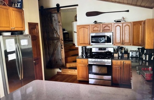 Manchester House | Dog-Friendly Lakeside Retreat with Hot Tub & Spa Amenities