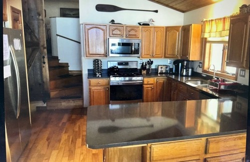 Manchester House | Dog-Friendly Lakeside Retreat with Hot Tub & Spa Amenities