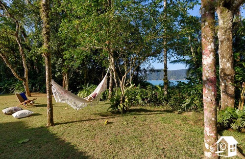 Praia Vermelha House | Oceanfront Retreat: Pet-Friendly with Spa & Hot Tub