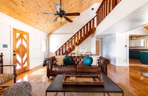 Dripping Springs House | Enchanting Log Cabin Retreat on 10 Acres in Dripping Springs