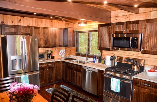 Deering House | Idyllic Log Home with Private Lake Access & Pool