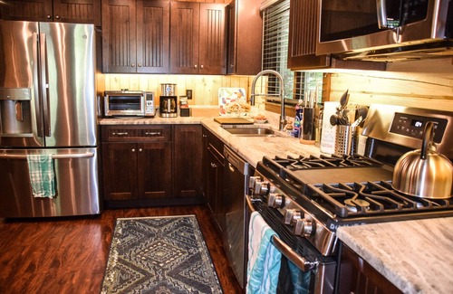 Deering House | Idyllic Log Home with Private Lake Access & Pool