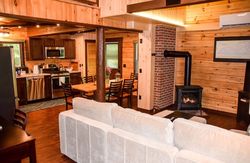 Deering House | Idyllic Log Home with Private Lake Access & Pool