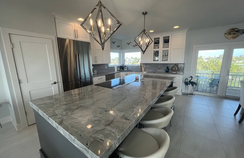 Nokomis House | Experience Breathtaking Sunrises with Pool & Spa Access