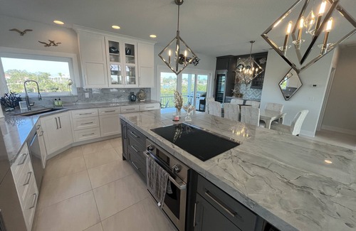 Nokomis House | Experience Breathtaking Sunrises with Pool & Spa Access