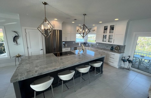 Nokomis House | Experience Breathtaking Sunrises with Pool & Spa Access