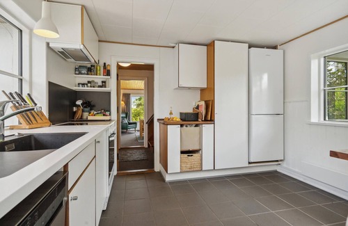 Vejlby Fed House | Relax in a Cozy Cottage with Breathtaking Ocean Views