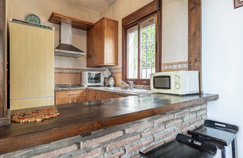 Sedella House | Spend the vacation in this inviting cottage in a beautiful location.