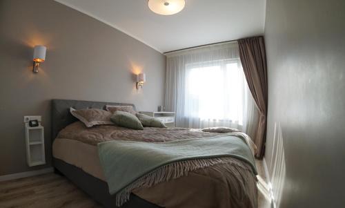 Ilguciems Apartment | Family-Friendly Getaway at Spilves 35 - Rated 9/10