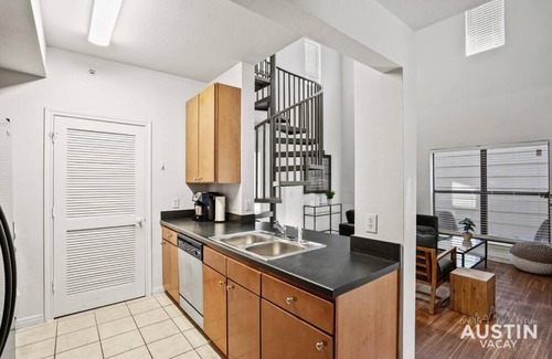 West Campus Apartment | Charming Loft Bedroom with Balcony and Child-Friendly Amenities