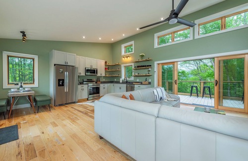 Spruce Pine Cabin | Discover Fun by the River: Fishing, Kayaking & Pet Friendly