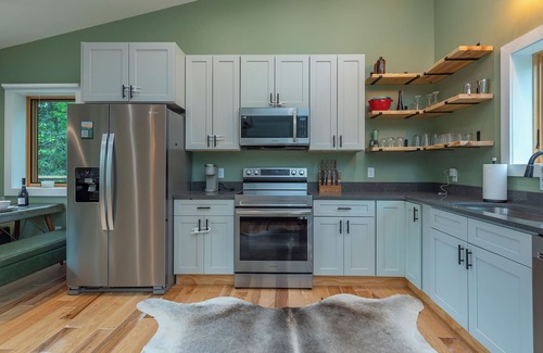 Spruce Pine Cabin | Discover Fun by the River: Fishing, Kayaking & Pet Friendly