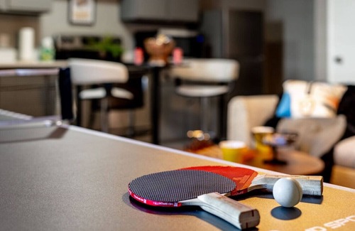 Plano House | Family Fun Awaits at Splash & Play Pool House with Game Room