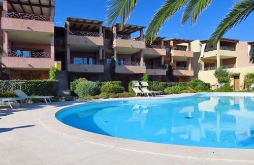 Porto Pozzo Apartment | Seaview Apartment N° 18: Pet-Friendly Oasis with Pool