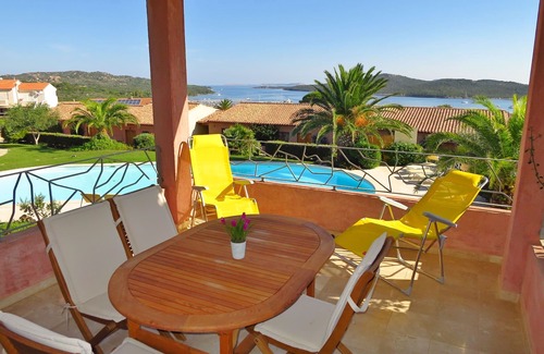 Porto Pozzo Apartment | Seaview Apartment N° 18: Pet-Friendly Oasis with Pool