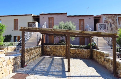 Porto Pozzo Apartment | Seaview Apartment N° 18: Pet-Friendly Oasis with Pool