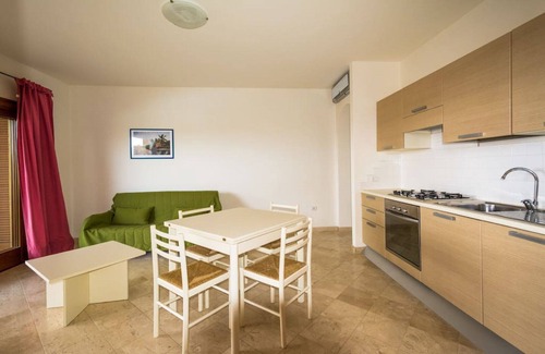 Porto Pozzo Apartment | Serene Seaview Apartment With Private Pool & Breakfast