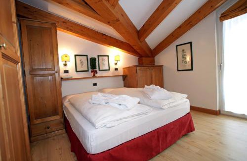 San Martino di Castrozza Apartment | Elegant Sporting Clubresidence: Oceanfront Retreat Awaits