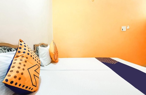 Jhansi Hotel | Budget-Friendly Stay at SPOT ON 77881 Kasturi Sai Darbar