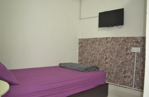 Kampung Batu Maung Hotel | Budget-Friendly Batu Maung Sempoi Inn with Family Amenities