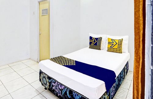 Waru Hotel | Budget-Friendly Stay at SPOT ON 91789 Kost Umik Sidoarjo