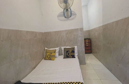 Gresik Hotel | Discover Karman's Sari Homestay: Family-Friendly Retreat