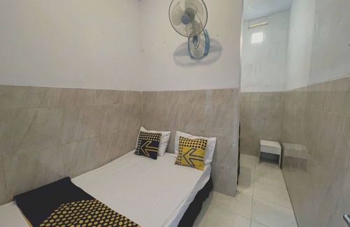 Gresik Hotel | Discover Karman's Sari Homestay: Family-Friendly Retreat