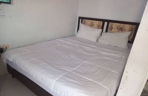 Purwokerto Hotel | Budget-Friendly Stay at SPOT ON 93557 Juan Kostel 2
