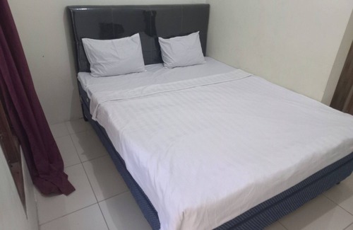 Purwokerto Hotel | Budget-Friendly Stay at SPOT ON 93815 Chimi Rumah Kost