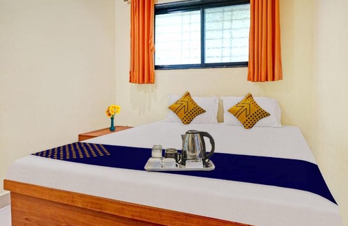 Wadgaon Hotel | Budget-Friendly Stay at SPOT ON New Sangam Lodging