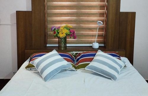 Thalassery House | Welcoming Sreedevi Gardens: Pet-Friendly & Family-Oriented