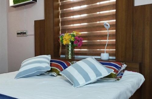 Thalassery House | Welcoming Sreedevi Gardens: Pet-Friendly & Family-Oriented