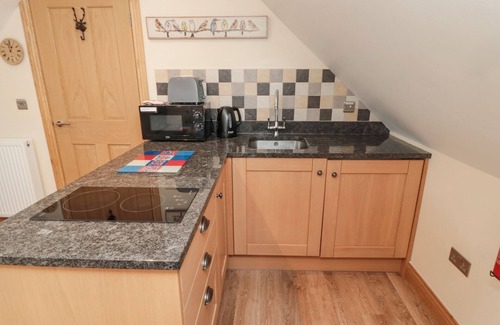 South Charlton Cottage | Relax at St. Dolmen: Oceanfront Pool Retreat in Embleton
