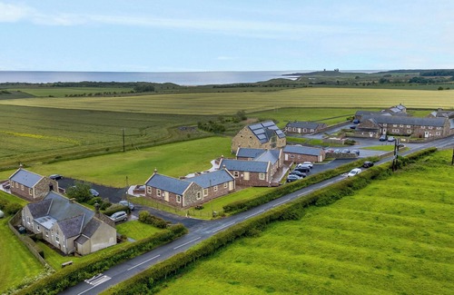 South Charlton Cottage | Relax at St. Dolmen: Oceanfront Pool Retreat in Embleton