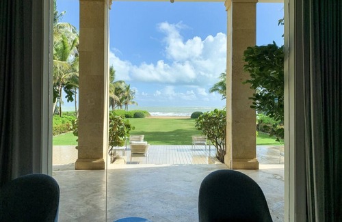 Herreras Condo | Elegant Villa Steps from Bahia Beach with Oceanfront Bliss