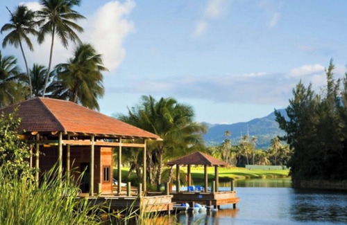 Herreras Condo | Elegant Villa Steps from Bahia Beach with Oceanfront Bliss