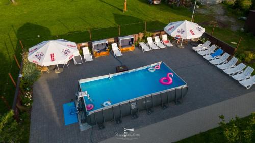Darlowko Cabin | Family-Friendly Oceanfront Stay at Stały Ląd with Pool