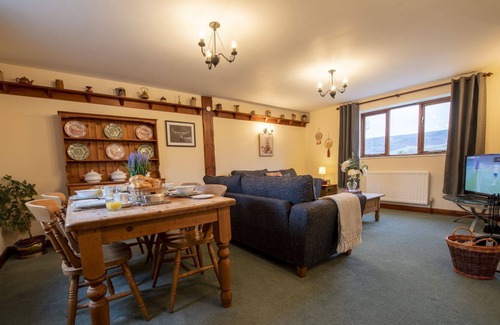 North York Moors National Park Cottage | Stable Cottage is a cosy two story Yorkshire stone cottage which sleeps five guests. Ideal for famil