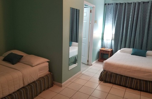 Buccoo Hotel | Cozy Standard Room B at Bellissimo with Breakfast Included