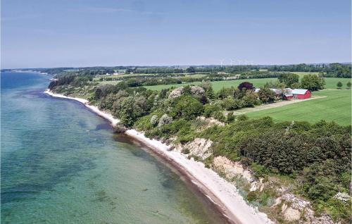 Akirkeby Apartment | Experience Oceanfront Bliss at Stangegaard Hotel