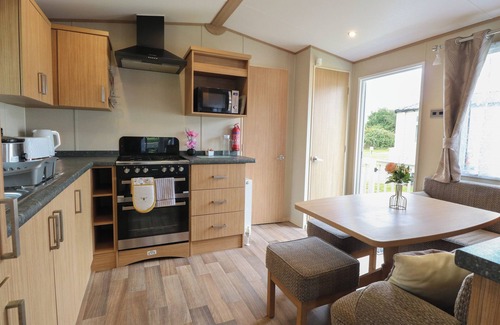 Hopton Cottage | Family-Friendly Stanley's Lodge with Pool in Belton, Norfolk
