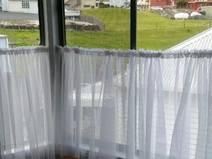 Stanley Apartment | Stanley Upstairs: Ocean View with 9/10 Guest Satisfaction