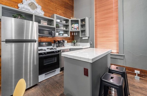 Downtown Apartment | Historic Starlet Hotel in Downtown Bryan - Family Friendly