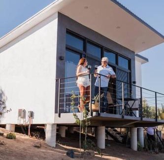 Valle de Guadalupe Bed & Breakfast | Inviting Cabin Retreat with Balcony in Villa Loar