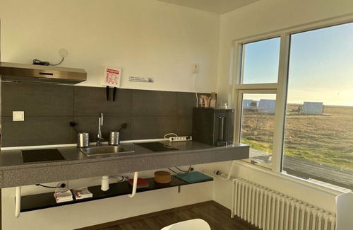 Eyvindarholar Cabin | Cozy Starlight Camping Pods with Family-Friendly Amenities