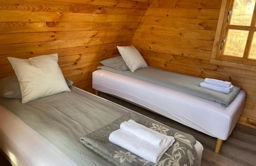 Eyvindarholar House | Cozy Starlight Camping Pods with Hot Tub & Family Amenities