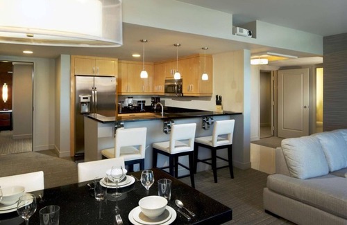 Las Vegas Apartment | Experience the Elara: Superbowl Corner Suite Awaits You