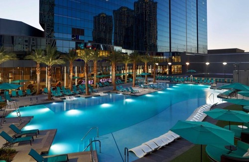 Las Vegas Apartment | Experience the Elara: Superbowl Corner Suite Awaits You